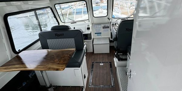 The heated cabin and helm aboard the Fish Invader