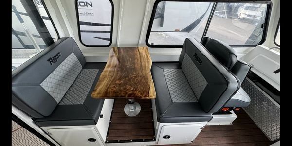 The dinette and interior of the Fish Invader